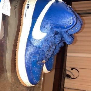 Blue and white Nikes size 6.5